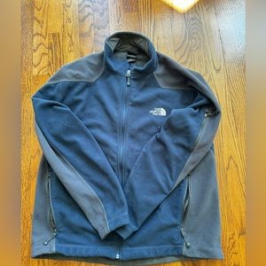 Navy and gray men’s North face fleece jacket in size large